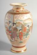 A JAPANESE SATSUMA VASE, painted with two panels depicting a family in a landscape scene, the base