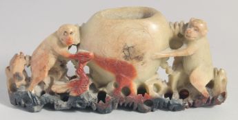 A CHINESE SOAPSTONE CARVING OF TWO MONKEYS, 16.5cm long.