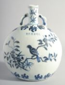 A CHINESE MING STYLE BLUE AND WHITE PORCELAIN MOON FLASK, each side paint with a bird on a branch,