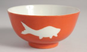 A CHINESE CORAL RED GLAZE PORCELAIN BOWL, bearing Qianlong six-character mark, 12.5cm diameter.