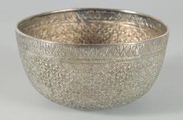 A FINE 19TH CENTURY THAI WHITE METAL BOWL, with embossed and engraved floral motifs, 14.5cm