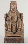 A LARGE 18TH/19TH CENTURY CHINESE HARDWOOD CARVING of an emperor seated upon a throne, with traces