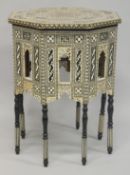 A LARGE MOORISH BONE AND MOTHER OF PEARL INLAID OCTAGONAL TABLE, with fine parquetry pattern