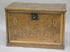 A GOOD MOORISH BONE INLAID WOODEN CHEST, with fine geometric pattern inlay, the front with hinged