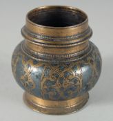 AN EARLY ISLAMIC - POSSIBLY AYYUBID, WHITE METAL INLAID BRONZE INKWELL, 5.5cm high.