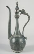 A 16TH CENTURY SAFAVID TINNED COPPER EWER, with hinged lid and curved handle terminating in an