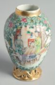 A SMALL CHINESE FAMILLE VERTE PORCELAIN JAR, painted with panels of figures, (lacking lid), 11cm