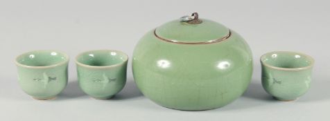 A CELADON CRACKLE GLAZED JAR AND COVER, together with three Korean cups, (4).