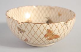 A FINE JAPANESE SATSUMA BUTTERFLY BOWL, painted with various colourful butterflies with fine gilt
