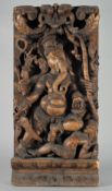 A LARGE INDIAN CARVED WOOD PANEL OF GANESH, 76.5cm x 37cm.