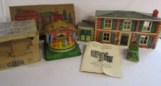 Mettoy 6173 'Farmer in the dell' musical toy and Mettoy 6255 metal dolls house (no furniture)