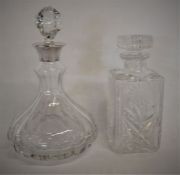 Silver rim ships decanter & a cut glass decanter