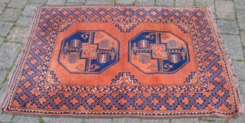 Pakistani red ground rug 138cm by 99cm