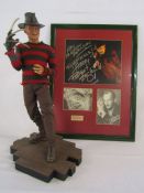 Limited edition Freddie Kruger 1/4 scale figure by Brian Dooley #0840/2000 and a signed photo from