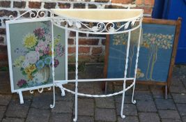 Arts & Crafts fire screen & a wrought iron fire screen both with needle point panels & a wrought