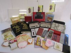 Selection of artist's canvas boards, various notebooks and pen sets to include Sheaffer