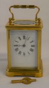 Striking French carriage clock (Ht 13.5cm with handle down)