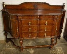 Large early 20th century serpentine fronted oak sideboard on Jacobean legs L 167cm D 55cm Ht 112cm
