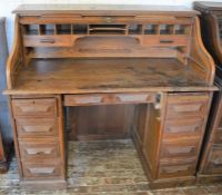Early 20th century oak tambour front desk