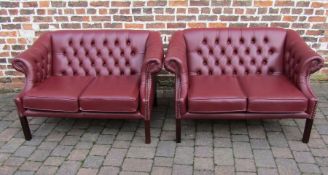 Pair of Viceroy design button backed red leather 2 seater Chesterfield style sofas