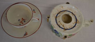 Possibly by Pinxton a bute shape teacup & saucer & inkwell with some restoration