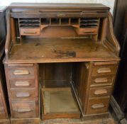 Early 20th century oak tambour front desk