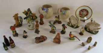 A mixed selection of collectables to include stone Chinese carved figures, blue tit ornaments, a