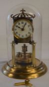 'CB' torsion clock under a glass dome Ht 39.5cm