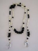 Fresh water pearl wrap necklace with quartz drops and possibly onyx beads, silver stamped cuffs