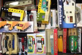 Approximately 60 boxed die cast vehicles inc. Burago, Days Gone, Matchbox, Van Guards etc.