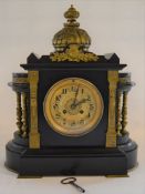 Ornate dome top black slate clock with side pillars Ht 43cm W 37cm D 17cm