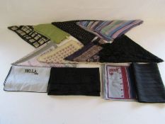 A collection of ladies long scarves to include mourning