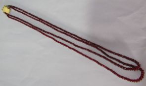 Twin strand ruby necklace with 18ct gold clasp