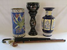 Umbrella stand (slight damage to rim) 2 walking sticks (one with duck brass handle) and umbrella,