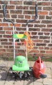 Flora Best electric rotovator & a watering can