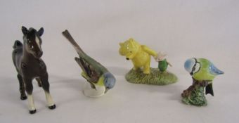 Beswick foal, W.Goebels Blue tit, Royal Doulton Winnie the Pooh and a Beswick blue tit