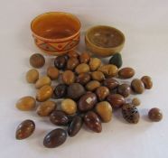 Collection of hardwood eggs, a wooden fruit bowl and a T F & S Ltd Moorish dish