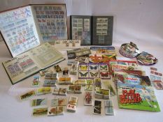 Collection of Brooke bond tea cards and stamp books, majority of stamps appearing untouched, also