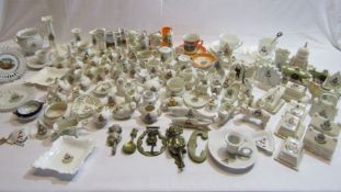 A very large collection of crested ware by different makers to include W.H.Goss, Gemma, Dainty Ware,