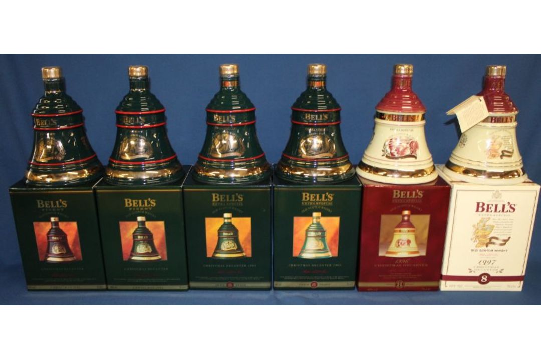 6 Bell's Extra Special Old Scotch Whisky Christmas Decanters 1992, 1993, 1994, 1995, 1996, 1997, all