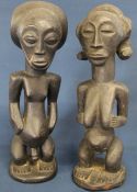 Pair of carved African figures 36cm high
