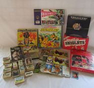 Selection of vintage games including Thunderbirds and a large collection of Brooke Bond collectors