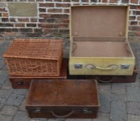Four vintage suitcases & a wicker picnic hamper