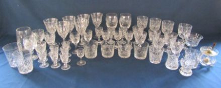 Large collection of glass and crystal drinking glasses