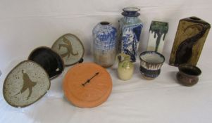 Collection of pottery items including vases, plates etc