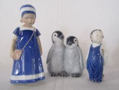 Royal Copenhagen 'Else' #1574, penguins #325, and boy with broom #3250