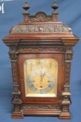 Victorian/Edwardian bracket clock in a mahogany case with silver & gilt dial with Westminster &