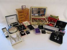 A selection of jewellery boxes and boxed loose costume jewellery