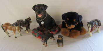 2 Rottweiler ornaments, a large sitting and soft toy Rottweiler also 2 Shire horses and another