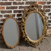 2 ornate oval wall mirrors, largest 90cm x 56cm